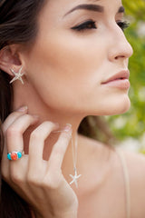 Silver Starlette drop pendant with silver Starlette studs and silver Barcelona ring with coral and turquoise.