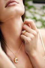 Shown: Gold vermeil white topaz Barcelona ring with gold vermeil rock crystal Belle Epoque pendant ($275).